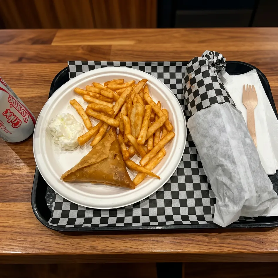 Beef donair with fresh salad and sauces at Original Shawarma Kensington Calgary