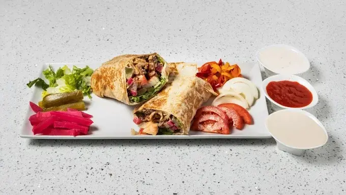 Halal beef and lamb shawarma plate with rice and vegetables at Original Shawarma Calgary