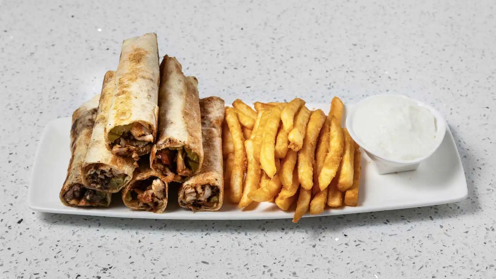 Beef and Lamb Shawarma Strips with fries and garlic sauce at Original Shawarma Calgary
